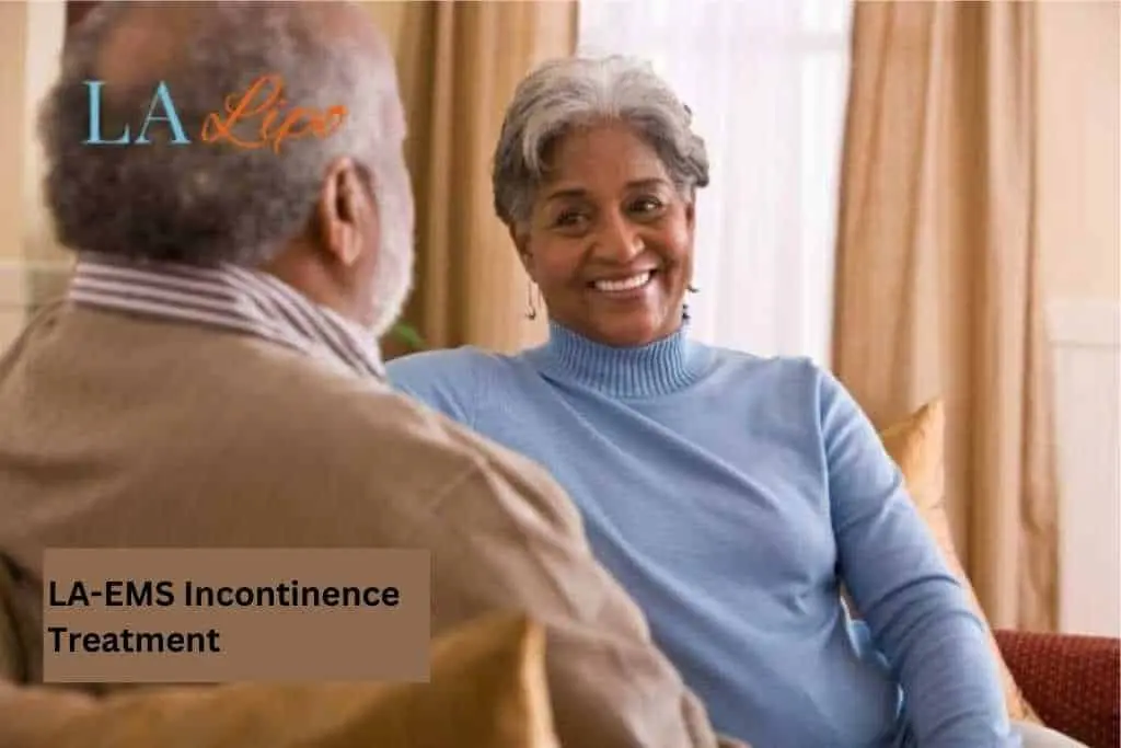 Couple sat smiling at each other - LA-EMS treatment West Barnes