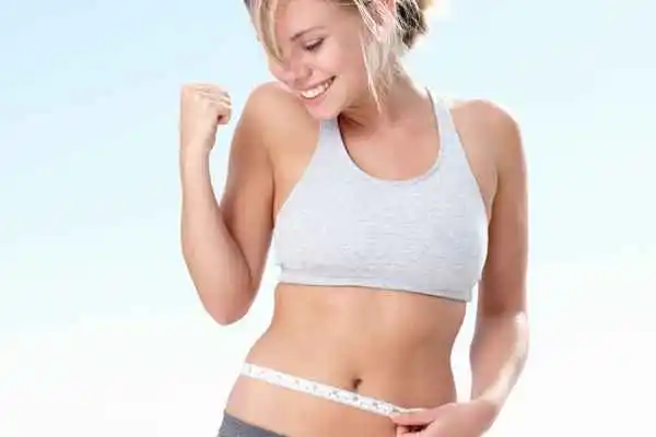 woman happy after fat reduction treatment West Barnes