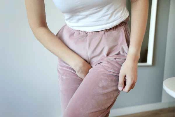 woman struggling with urine incontinence West Barnes